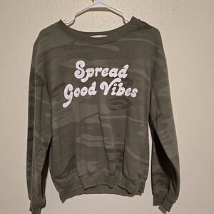Green Camouflage Sweatshirt with 'Spread Good Vibes'